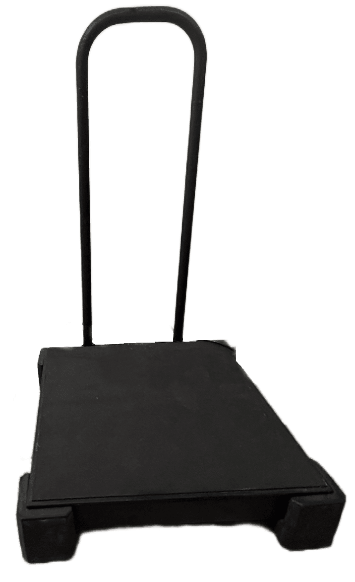 The vibration plate at Elevate Wellness Studio: a low black platform with a tall U-shaped handle to hold